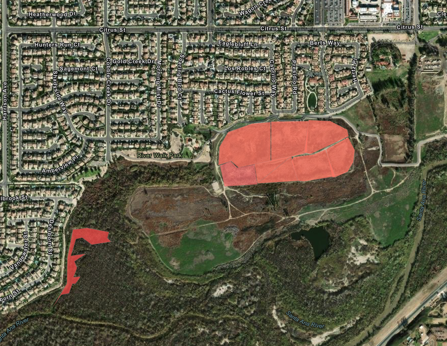 Aerial view of a residential area next to a park and River Walk Park, with highlighted red zones.