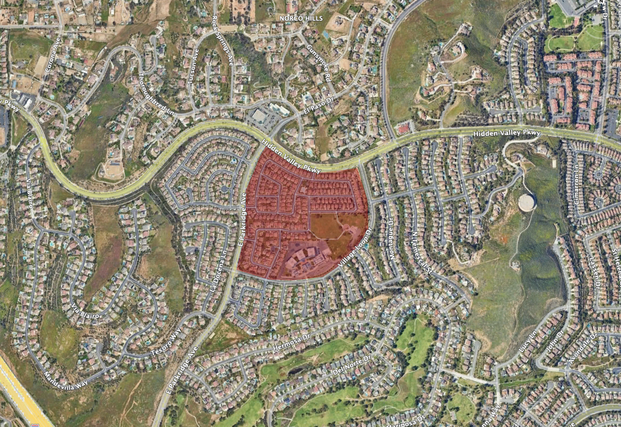 The image shows a map of a suburban area with residential neighborhoods, highlighting a specific zone in red.