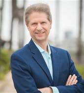 May contain: blazer, clothing, coat, jacket, formal wear, face, head, person, photography, portrait, suit, adult, male, and man