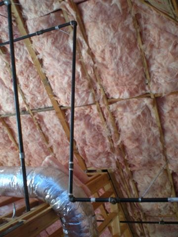 may contain: pipes, insulation, wood