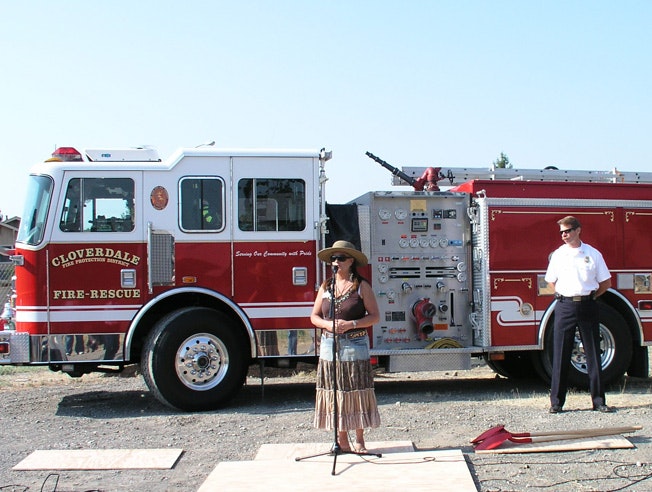 May contain: person, human, truck, vehicle, transportation, and fire truck