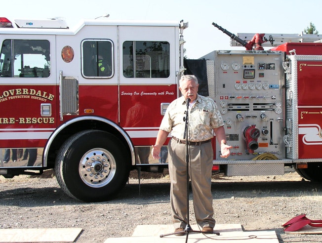 May contain: person, human, truck, vehicle, transportation, and fire truck