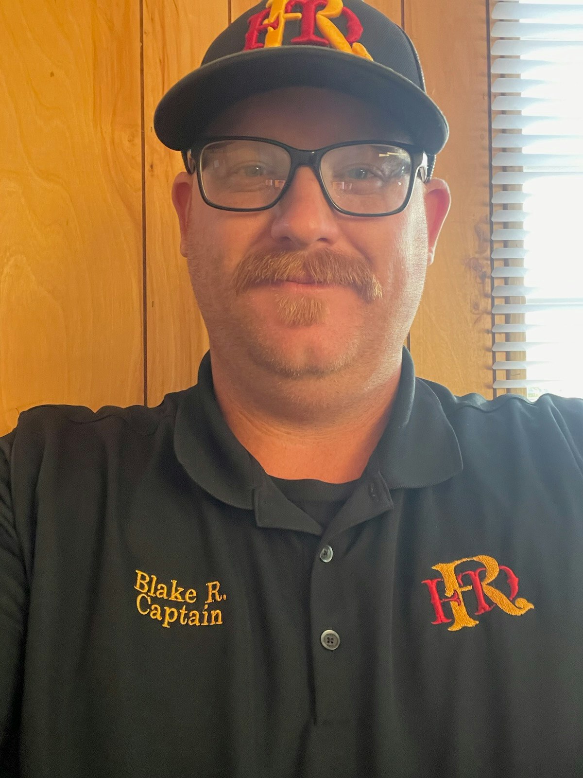 May contain: accessories, face, glasses, head, person, photography, portrait, baseball cap, cap, clothing, hat, adult, male, man, t-shirt, mustache, and shirt