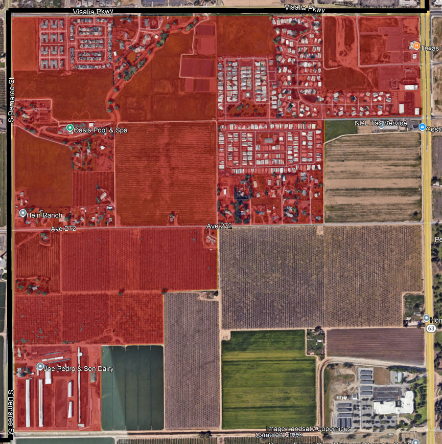 Aerial view of agricultural fields, residential areas, and some labeled locations like "Oasis Pool & Spa" and "Joe Pedro & Son Dairy".