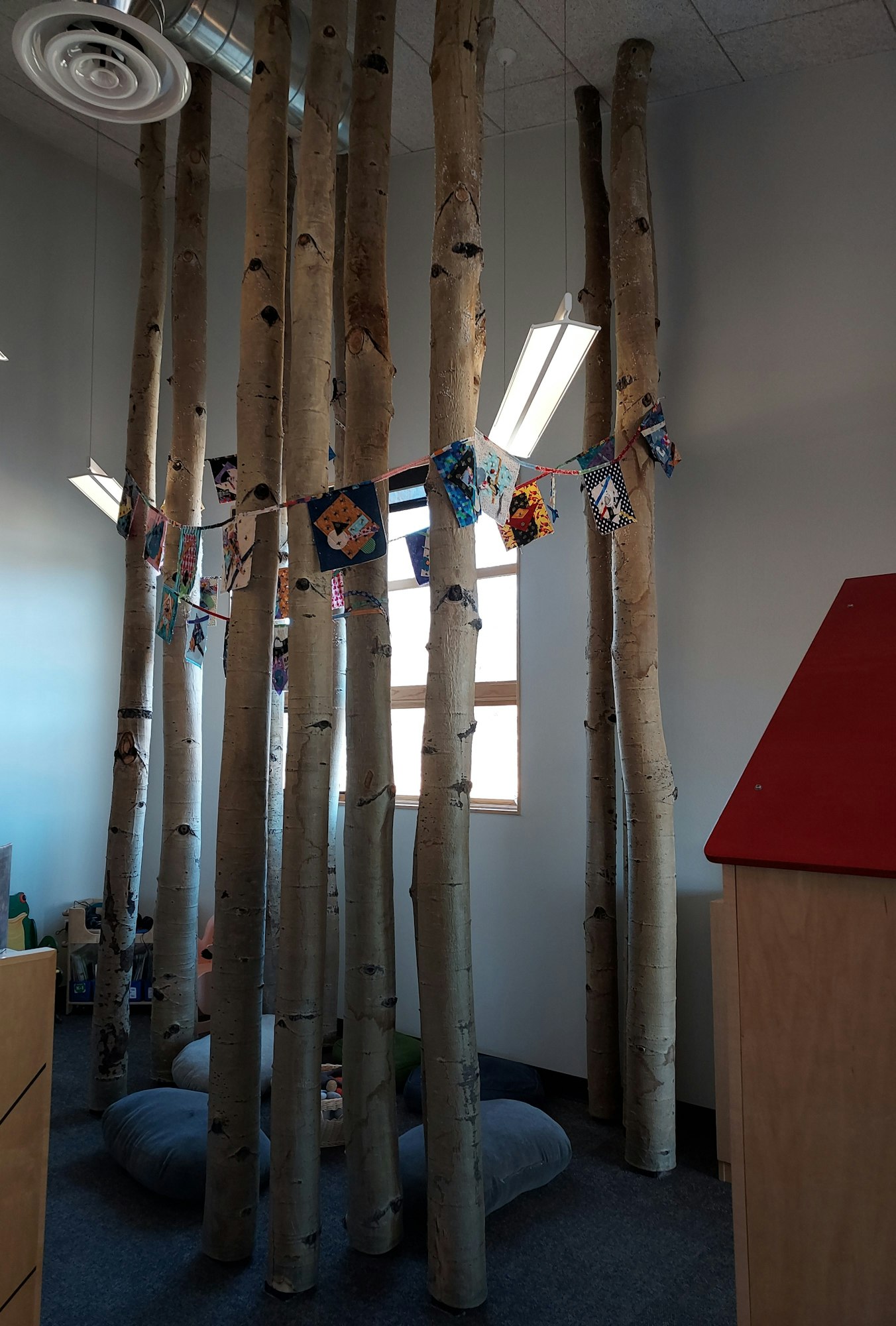 Aspen tree play area inside the library