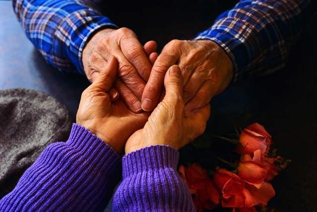 May contain: hand, person, human, and holding hands