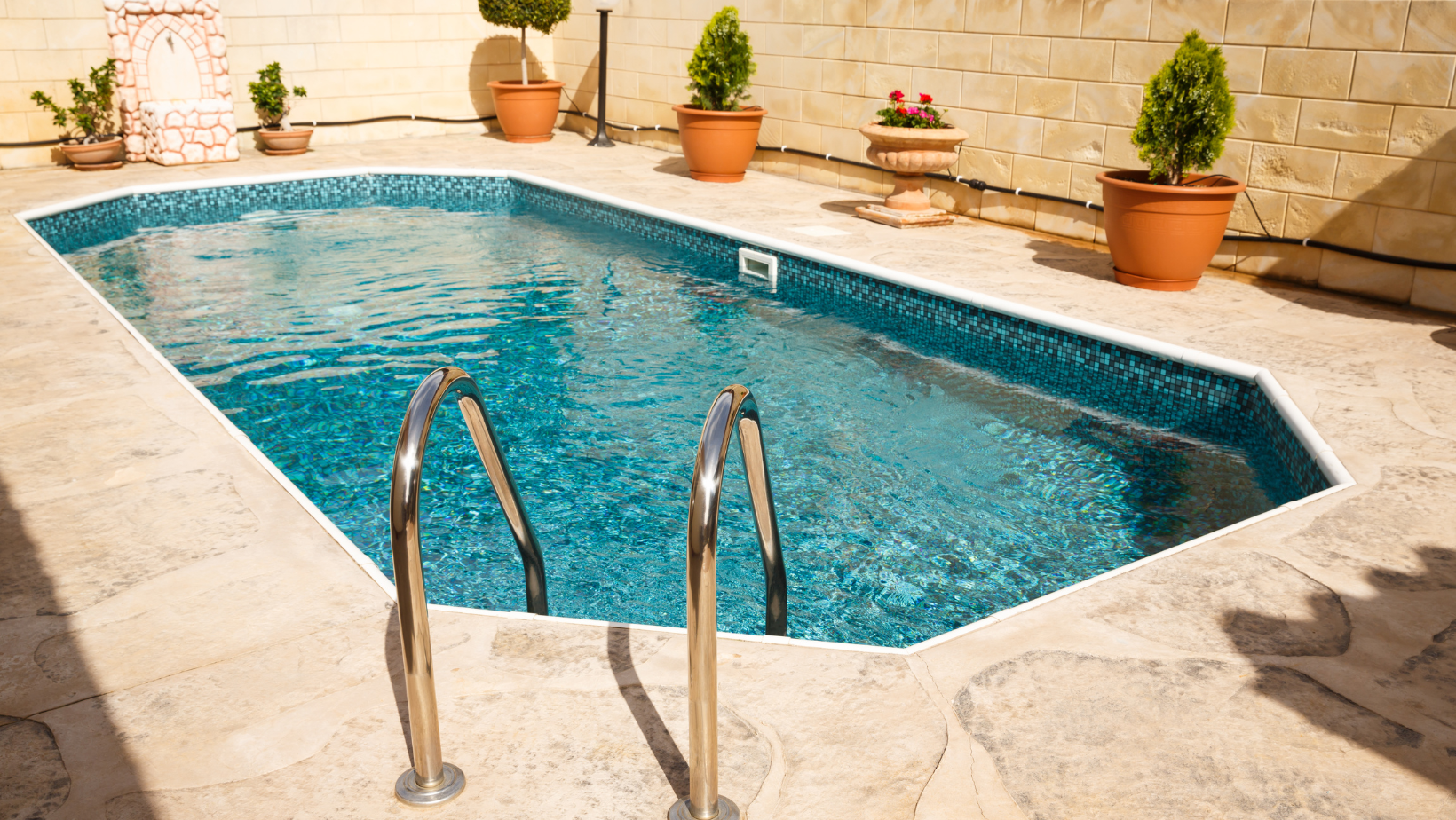 May contain: pool, water, swimming pool, plant, backyard, nature, outdoors, yard, and tub