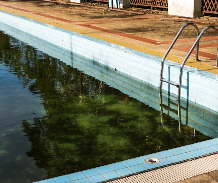 May contain: water, pool, outdoors, handrail, banister, and nature