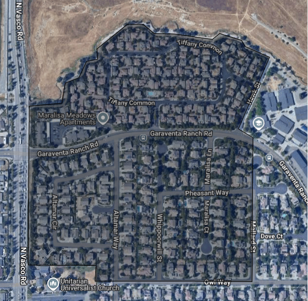 Aerial view of a residential area with labeled roads and landmarks, including Maralisa Meadows Apartments.