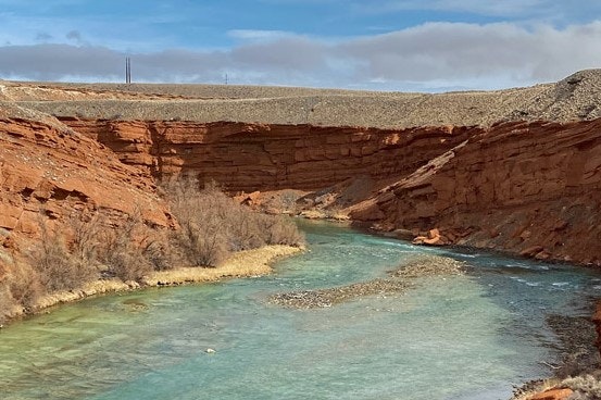May contain: nature, outdoors, mountain, water, and valley
