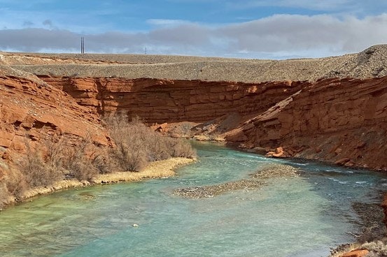 May contain: nature, outdoors, mountain, water, and valley