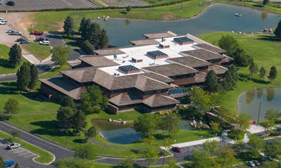 May contain: building, architecture, outdoors, aerial view, waterfront, and water