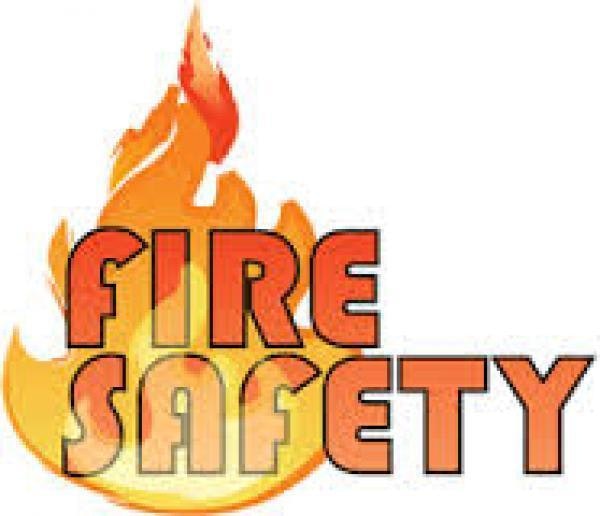 The image shows the words "FIRE SAFETY" with a flame graphic as part of the design.