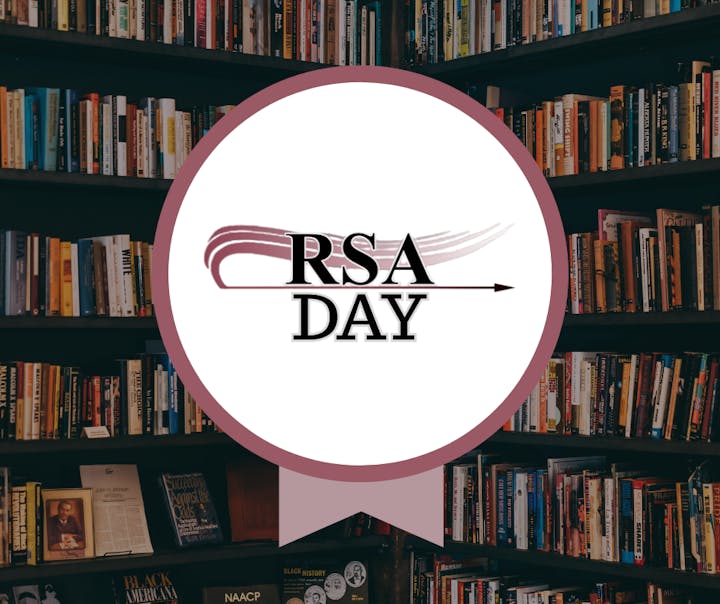 The image features a bookshelf filled with books and a circular logo or badge that says "RSA DAY."