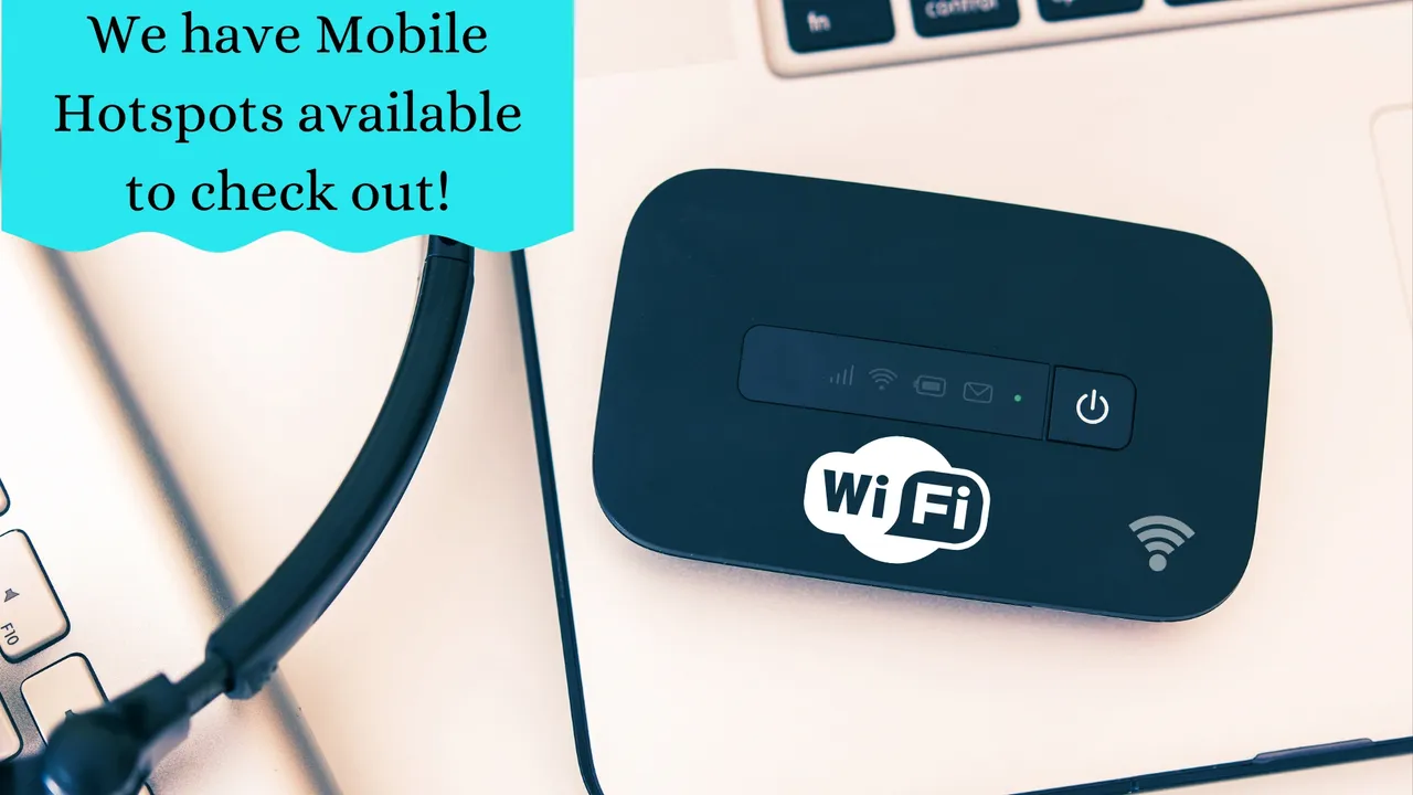 Photo of laptops and a wifi booster with text: We have Mobile Hotspots available to check out!