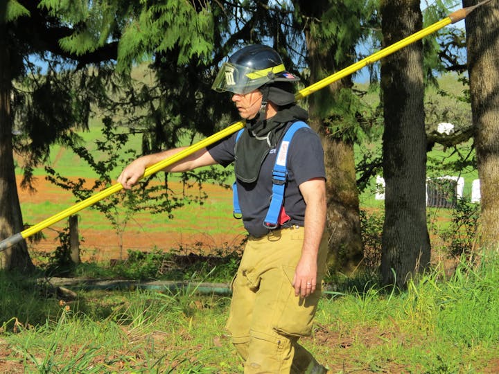 May contain: person, human, clothing, apparel, helmet, and hardhat
