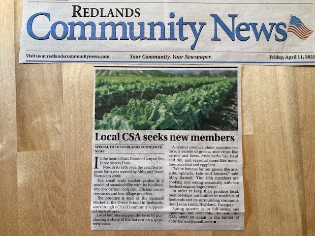 A newspaper article about a local CSA seeking new members with a focus on sustainable farming and organic produce.