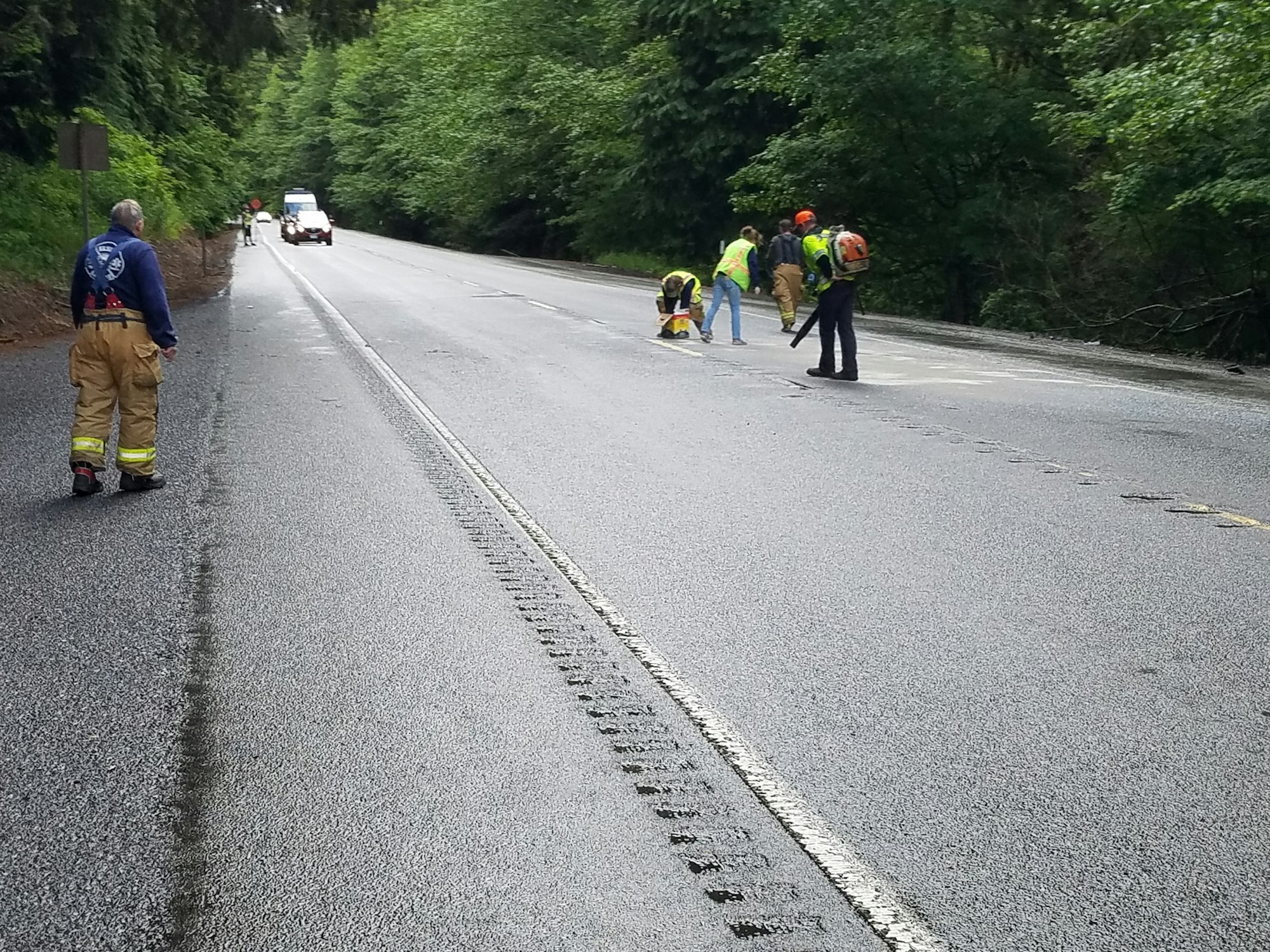 May contain: walking, person, tarmac, road, shoe, footwear, clothing, and helmet