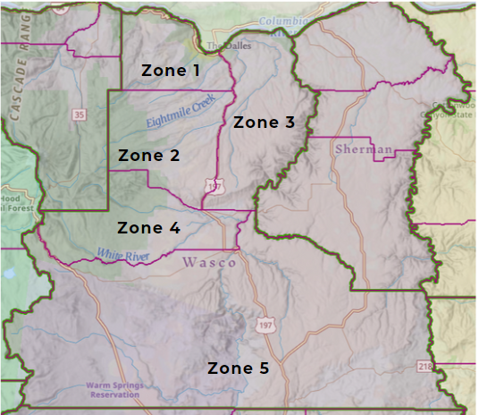 Map with labeled zones, roads, and geographic features.