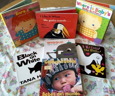 May contain: book, publication, hat, clothing, comics, person, and baby