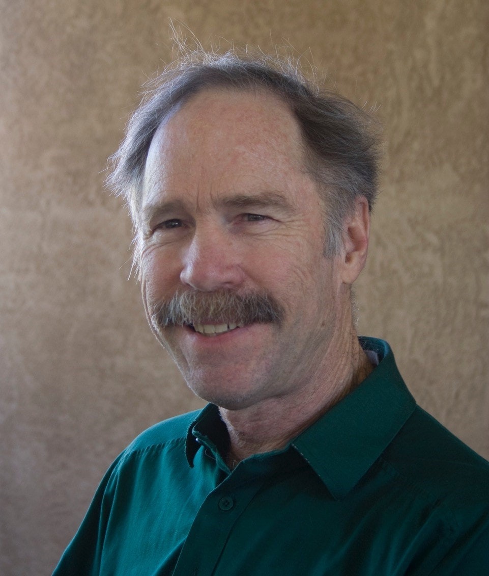 May contain: portrait, head, face, person, photography, man, adult, male, smile, happy, and mustache