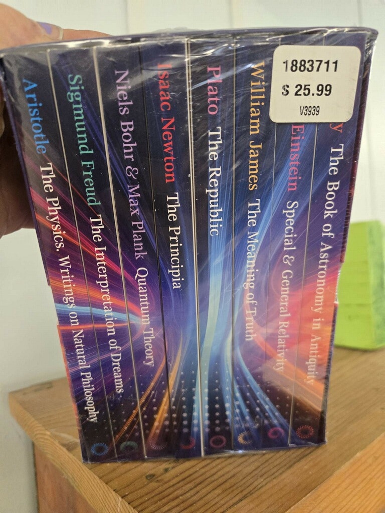 A stack of books featuring classic works by philosophers and scientists, priced at $25.99.