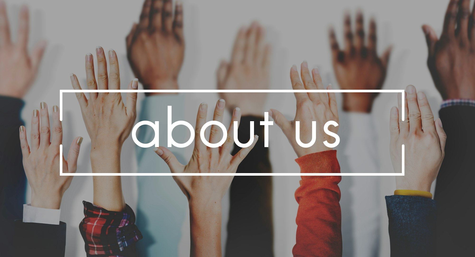 Raised hands with the text "about us" overlaid on the image.