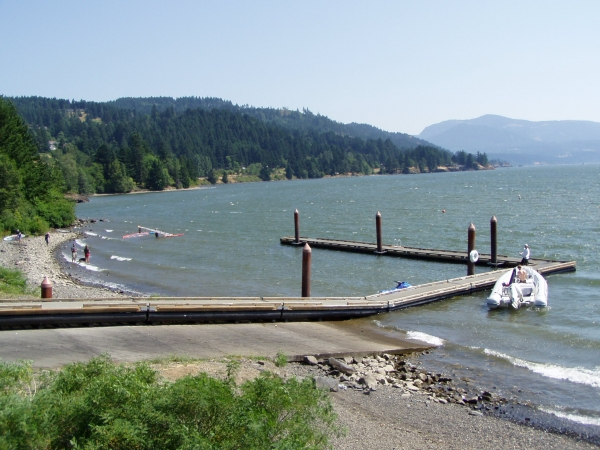 May contain: water, waterfront, nature, outdoors, scenery, boat, transportation, vehicle, port, pier, and person