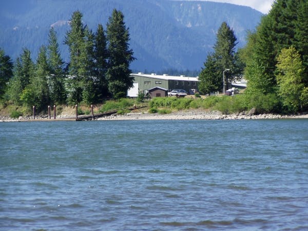 May contain: nature, outdoors, scenery, plant, tree, fir, vegetation, car, transportation, vehicle, lake, water, conifer, waterfront, and land