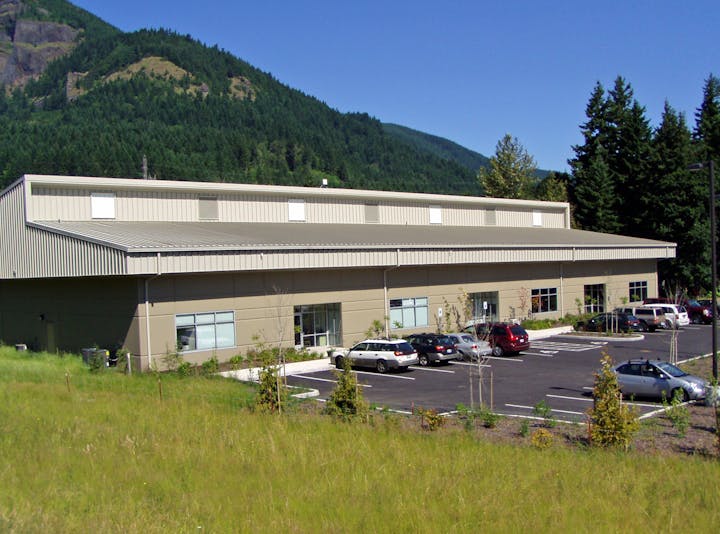 May contain: architecture, building, plant, tree, fir, car, transportation, and vehicle