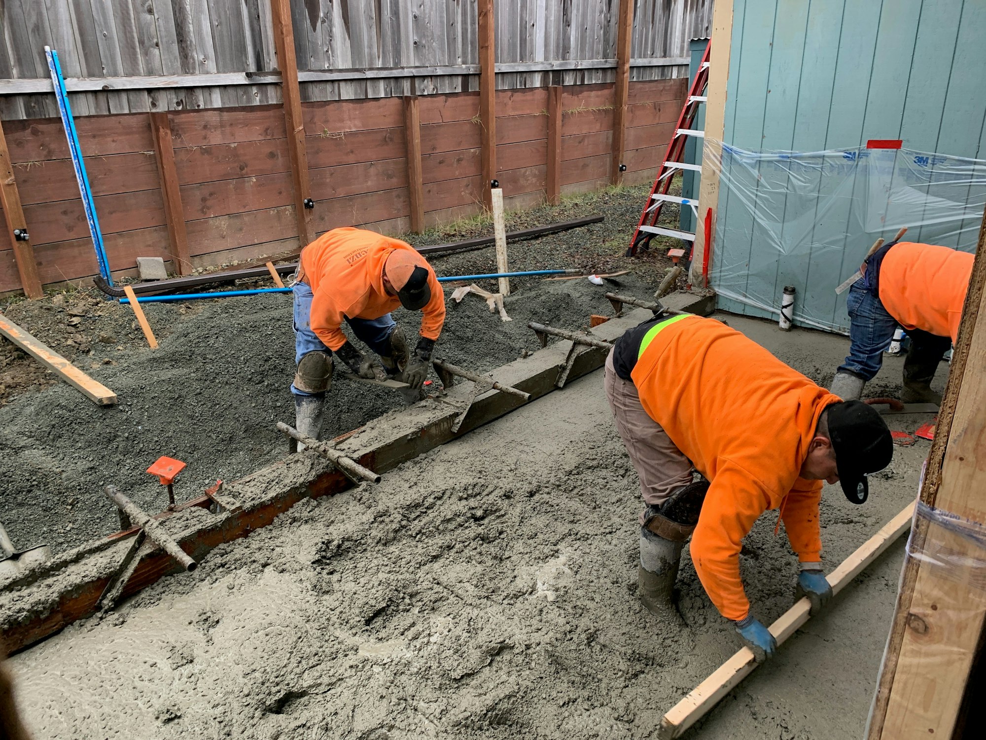 May contain: soil, person, human, construction, and wood