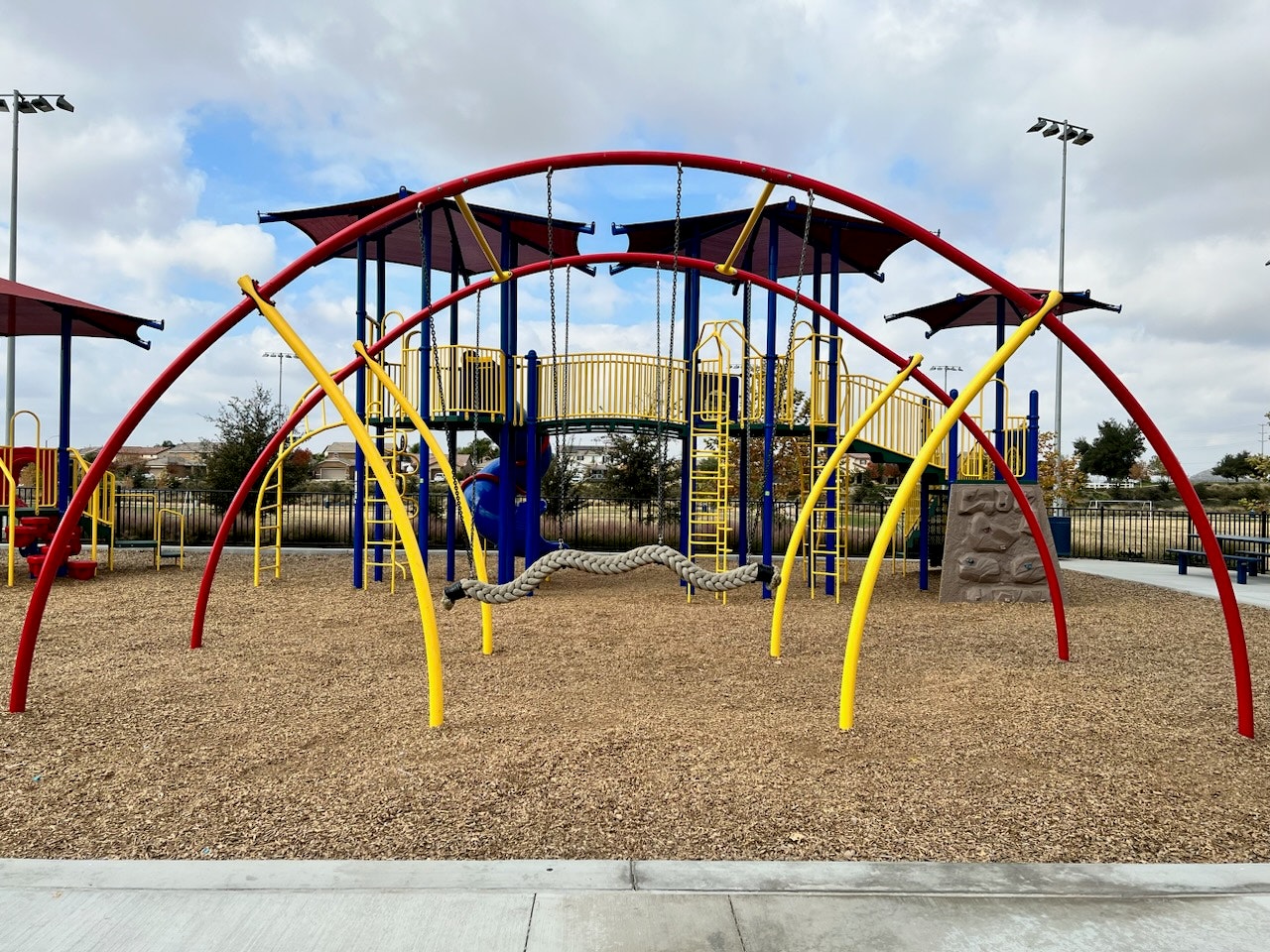 May contain: outdoor play area, outdoors, play area, bench, and furniture