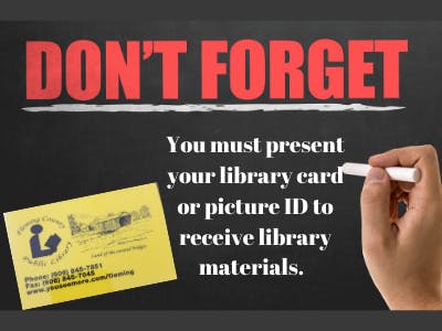 A reminder sign to present a library card or ID to receive library materials, with a hand holding a marker, and a library card depicted.