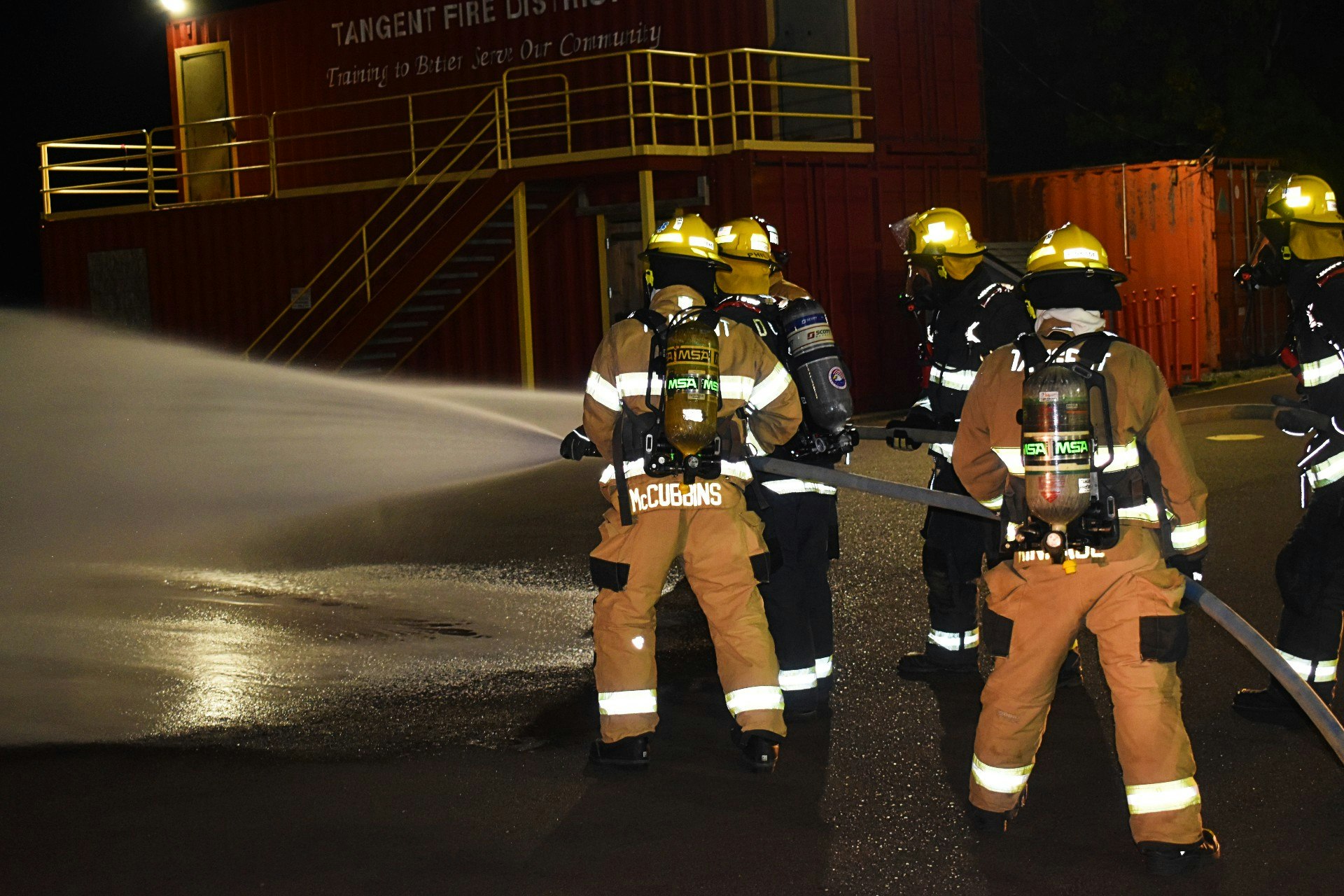 May contain: person, human, fireman, helmet, clothing, and apparel