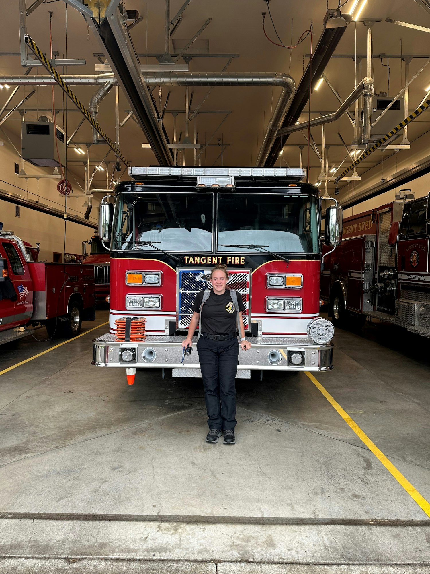 May contain: bumper, transportation, vehicle, clothing, footwear, shoe, adult, male, man, person, fire truck, and truck