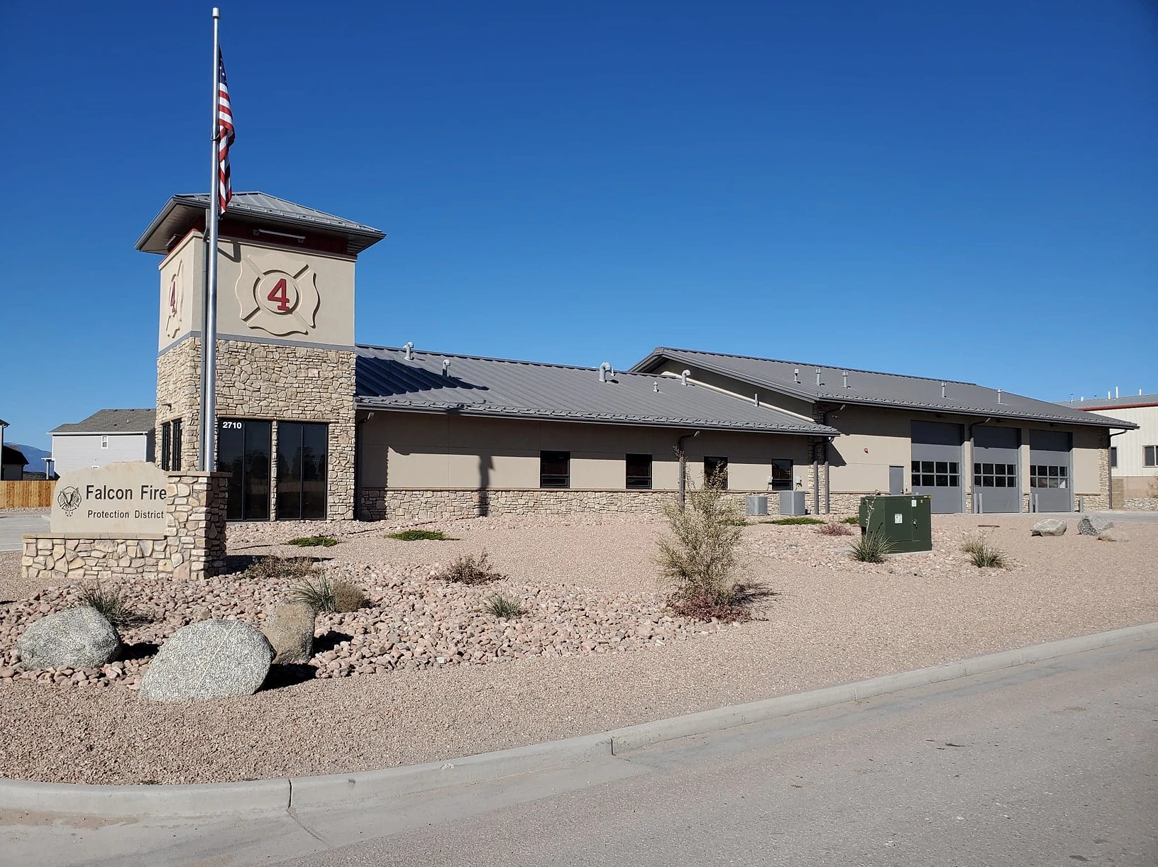 fire station with landscaping in front of building