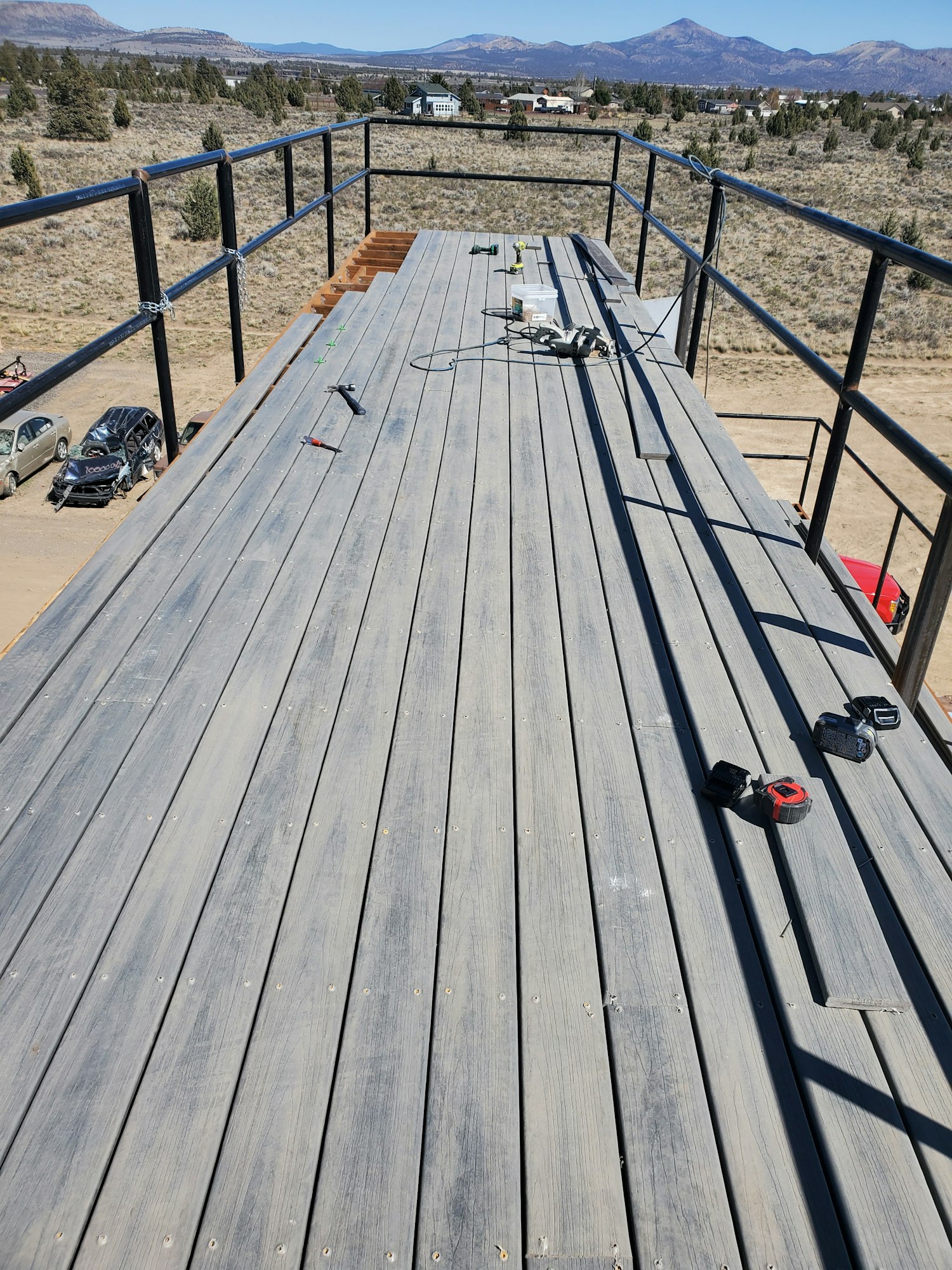 May contain: boardwalk, building, bridge, railing, handrail, and banister