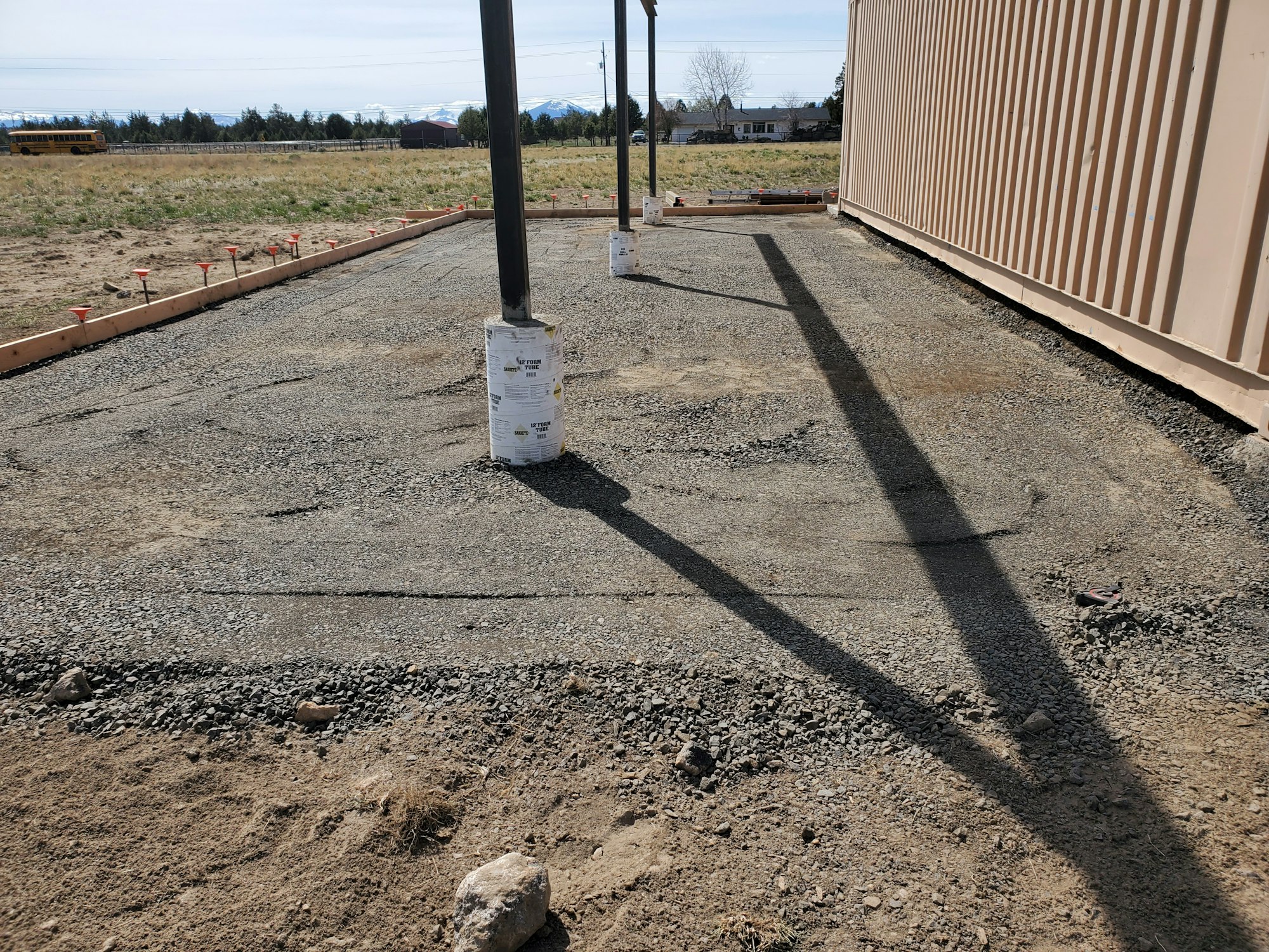 May contain: gravel, dirt road, road, ground, railway, transportation, train track, and rail