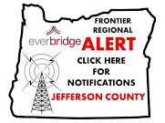 An alert notification sign for Jefferson County with a "Click Here for Notifications" prompt, featuring a radio tower and Everbridge logo.