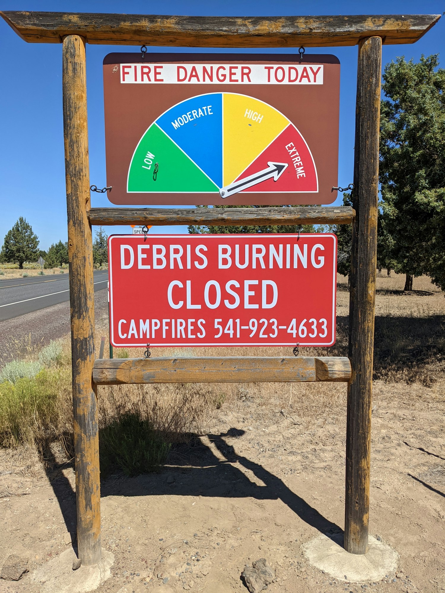 May contain: symbol, road sign, and sign