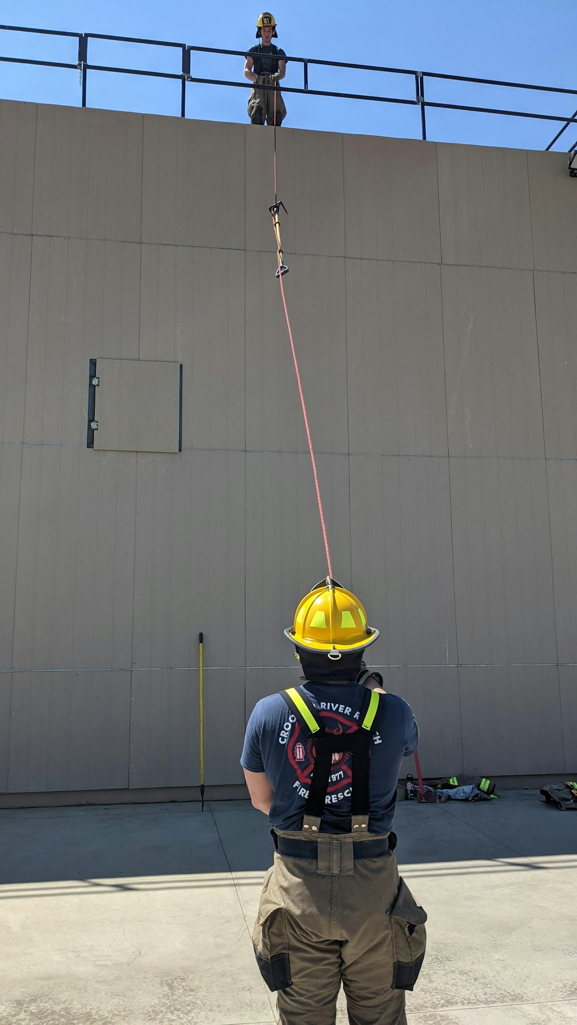 May contain: person, human, helmet, clothing, apparel, and fireman