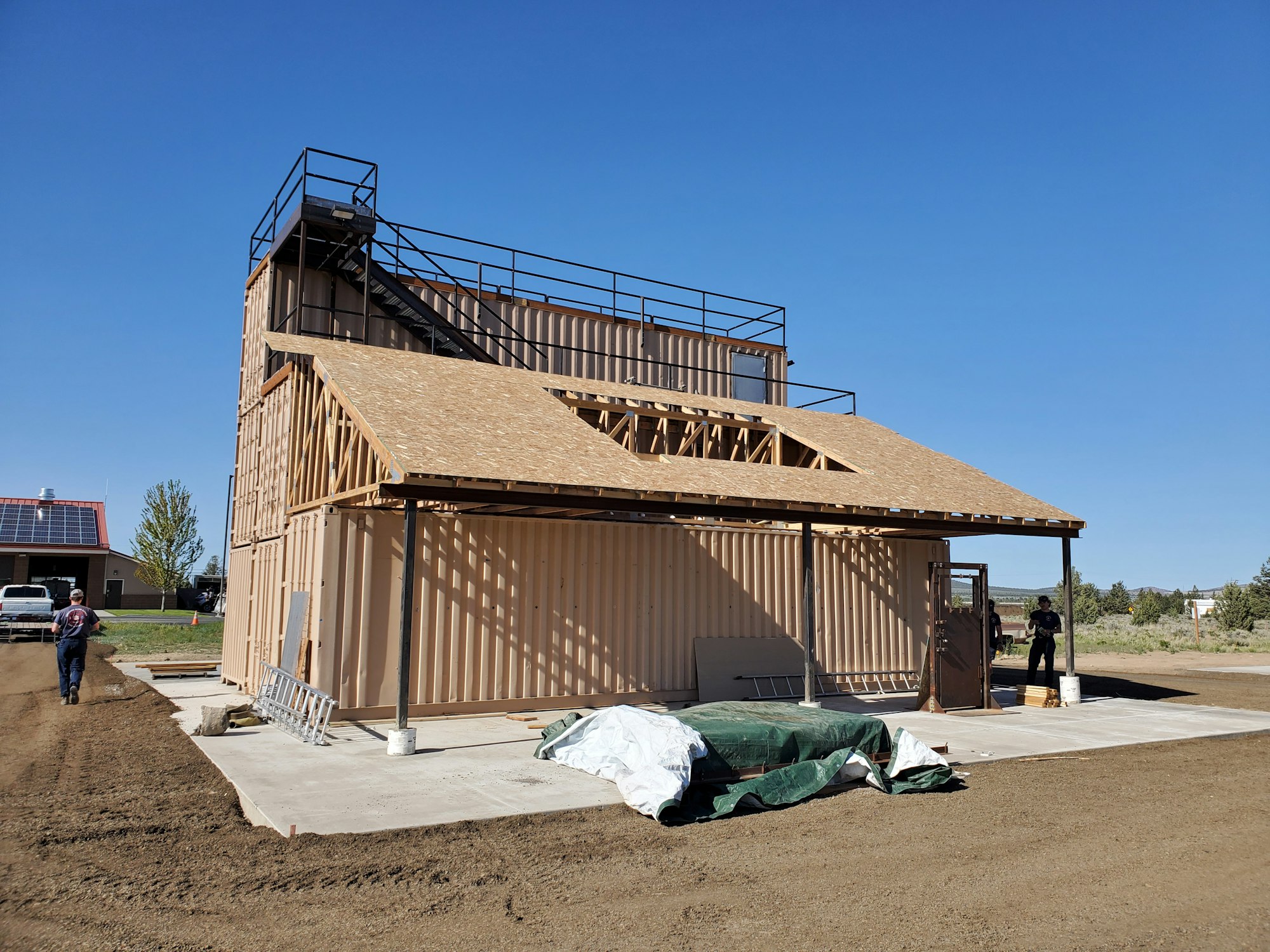 May contain: person, human, shelter, countryside, rural, nature, outdoors, building, and housing