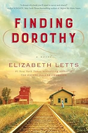 Book cover: "Finding Dorothy" by Elizabeth Letts. It features a railway track leading to small buildings, with trees and sky in the background.