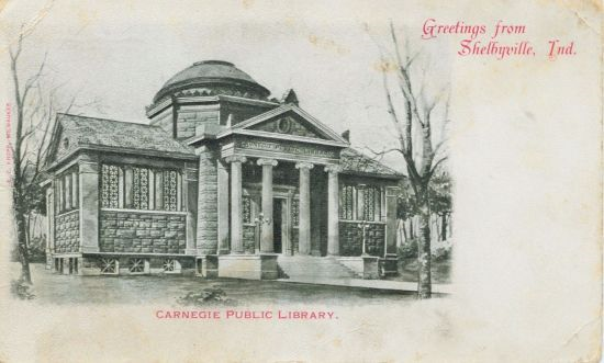 Vintage postcard of Carnegie Public Library in Shelbyville, Indiana, with "Greetings from Shelbyville, Ind." text.