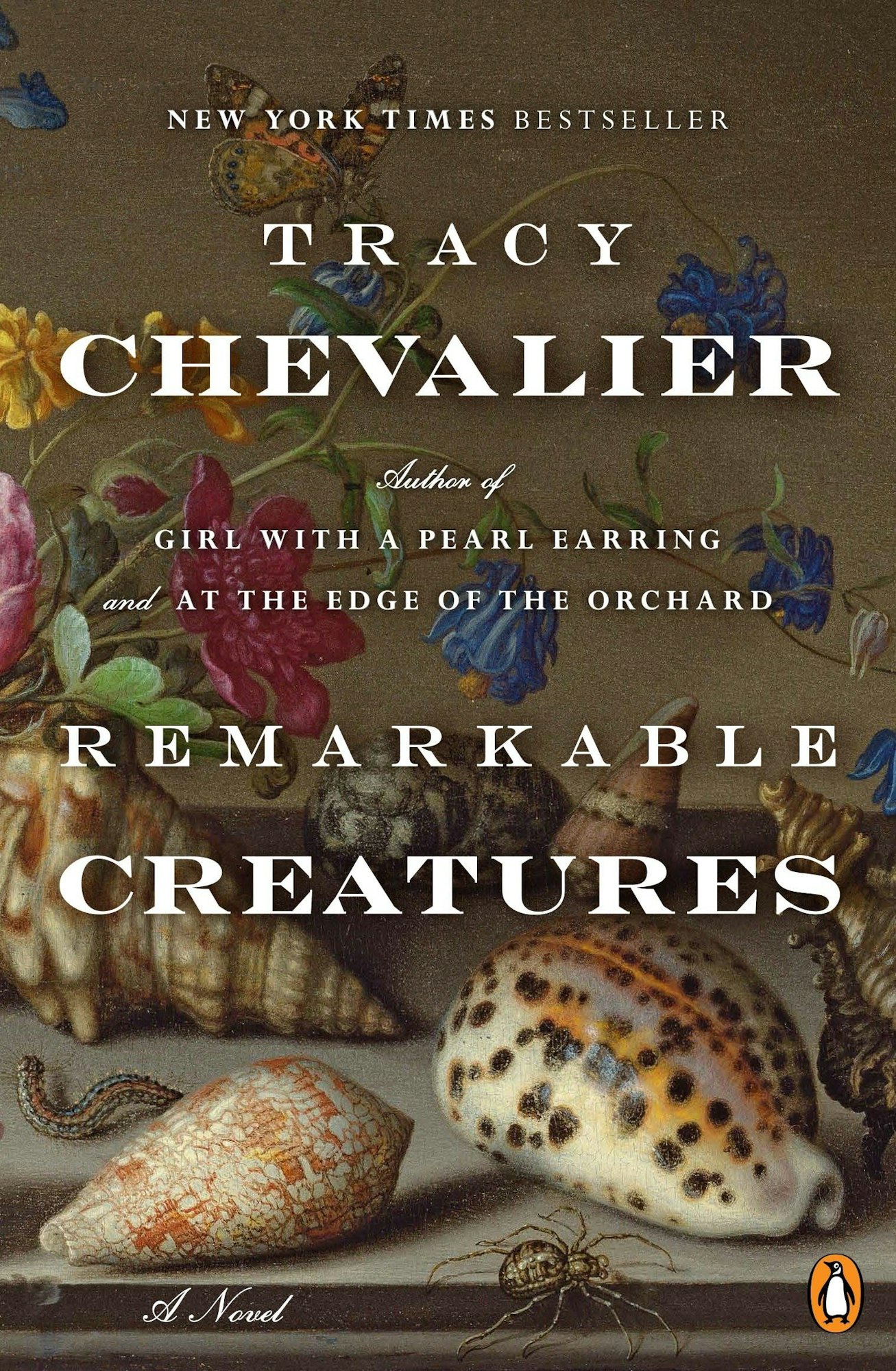 Book cover: "Remarkable Creatures" by Tracy Chevalier, features flowers, seashells, and a butterfly.
