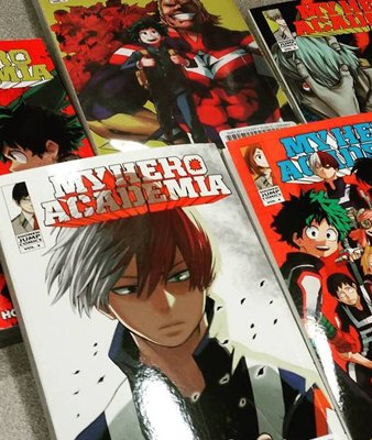 Collection of "My Hero Academia" manga volumes featuring various characters on the covers.