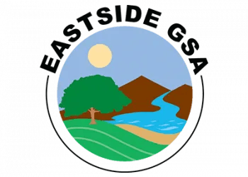 A logo with a nature scene including a tree, river, sun, and mountains, featuring the text "EASTSIDE CSA".