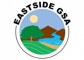 A logo with a nature scene including a tree, river, sun, and mountains, featuring the text "EASTSIDE CSA".