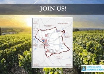 A promotional poster with text "JOIN US!", a map, and a background of vineyards under a clear sky.