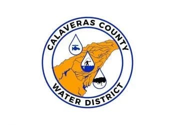 Logo of Calaveras County Water District; features a map outline, water drops, and a bat inside a blue and white circle.